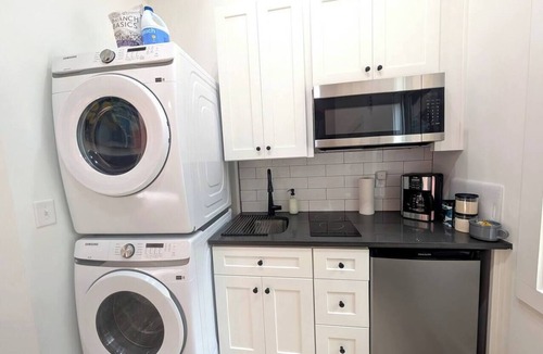 Southeast Raleigh House | Mural Mania - Fire pit, EV Charger!