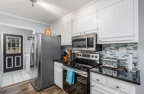 Northeast Raleigh House | NEW! Cozy Raleigh Home w/Porch & Fenced yard-Mins to Downtown ! *pet friendly*