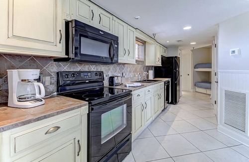 Wrightsville Beach Condo | Ocean Views, Balcony, Pool, STEPS to Beach Restaurants Shops