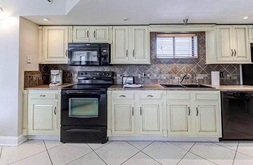 Wrightsville Beach Condo | Ocean Views, Balcony, Pool, STEPS to Beach Restaurants Shops