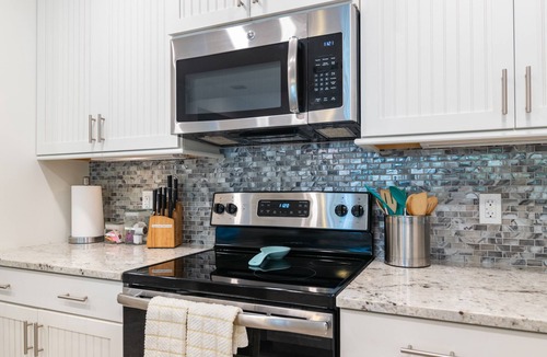 Whitney Beach House | One Particular Harbour 379-101 Condo · Pet-Friendly · Marina · Pool