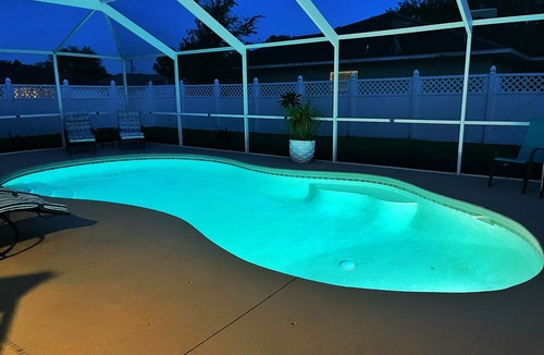 Vero Lake Estates House | ☆☀︎❀Palm Paradise! Heated Pool, Lanai with TV, Grill, & Fenced Yard!