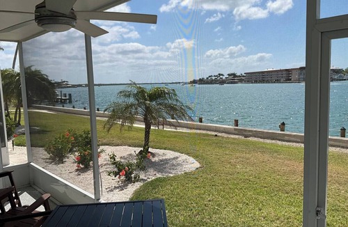 Isles of Capri Apartment | Paradise on the Isles - Stunning Waterfront Views - Pool & Dock Steps Away