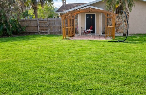 Sebastian Highlands House | Patio Retreat! Family Getaway with Large Privacy Fenced Yard! 6 miles to Beach!