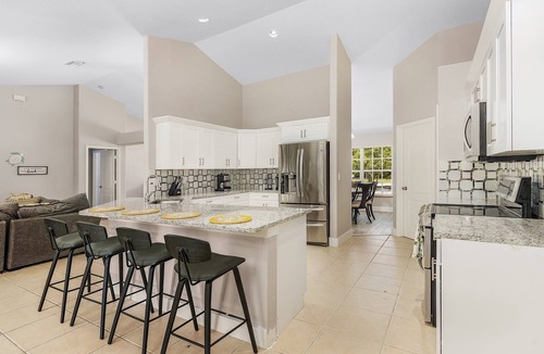 Trafalgar Villa | Pet friendly spacious home for large groups! Pool & jacuzzi, game room!