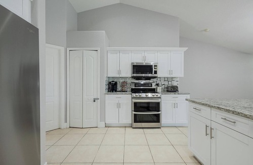 Trafalgar Villa | Pet friendly spacious home for large groups! Pool & jacuzzi, game room!