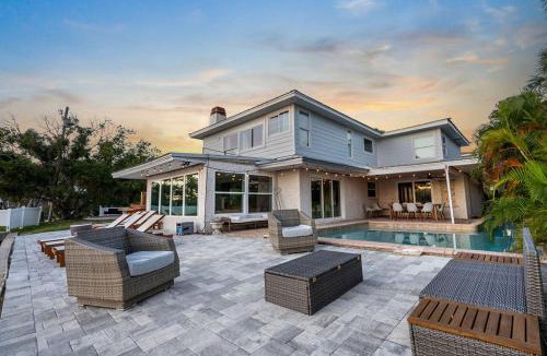 Ozona House | Pink Pony Villa - Waterfront Escape with Pool & Themed Rooms