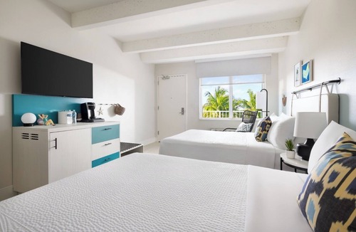 New Town Hotel | Poolside Paradise l Fire Pits, Lawn Games, Live Music & Endless Fun