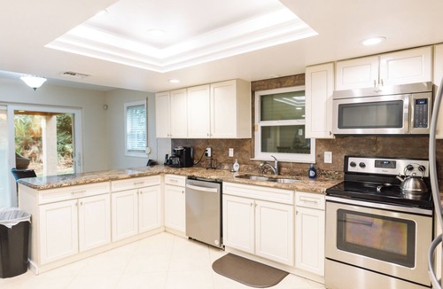 Ocean Park House | Private Oceanfront Estate Pickleball court Pool Spa Golden Sands® Pearl