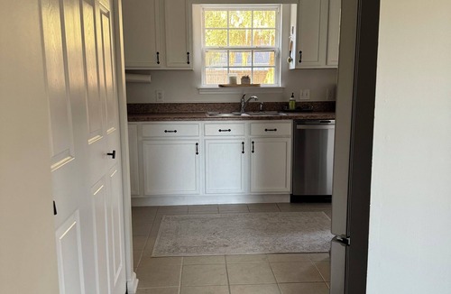 Beaufort House | Quaint Lady’s Island home with a large fenced in yard shaded by a mossy oak!