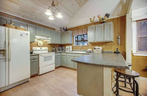Cullowhee House | Quiet dog-friendly riverfront house with large back deck, hot tub, fireplace