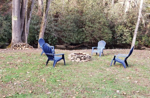 Murphy RV Rental | Relax in a Safari Glamp Tent beside the creek, firepit- outdoor experience.