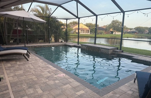 Riverview House | Relax in my calm and stylish space. Enjoy the relaxing lakeview and heated pool.