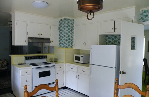 Woodbine House | Relax on the Screened Porch or Enjoy the Nearby Area Attractions