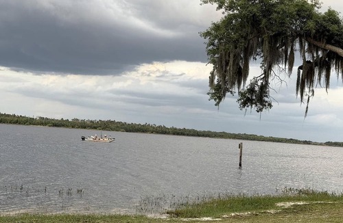 Braden River RV Rental | Relaxing Safari Tent with Fire Pit Near Anna Maria Island in Bradenton, Florida