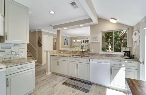 Lawton Woods House | Renovated coastal Sea Pines beach home with a private pool