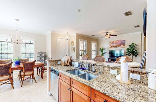 Ole Condo | Resort condo with private W/D, shared pool, and central AC
