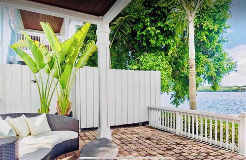 Coquina Key Condo | Resort style Luxury condo on the waterfront with private patio overlooking bay.