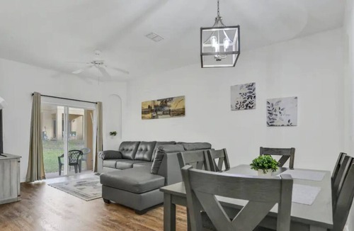 Regal Palms Villa | Resort townhome with patio, on-site pool and hot tub, gym, pool table, AC & W/D