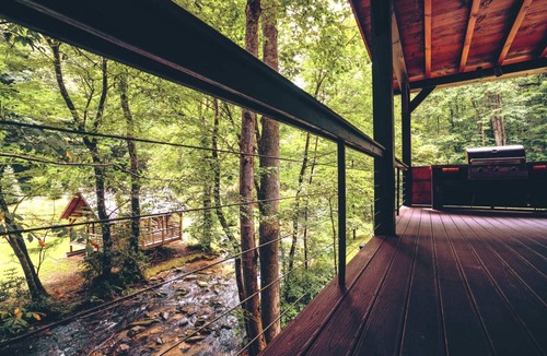 Topton Cabin | River Lodge-Pet Friendly, Luxury Log Cabin Rental, 3 Bedrooms, 5 Fireplaces, Hot Tub, 2 Decks with Outdoor Entertaining Areas on Creek in Western NC