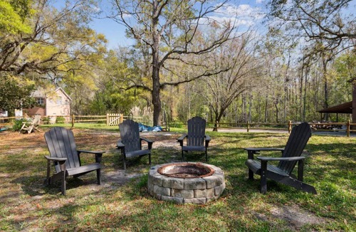 Camden County Cabin | Riverbank Cabin-Saint Mary’s, Kingsland, and Amelia Island with pool and firepit