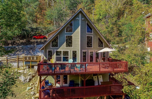 Flat Hollow Marina Cabin | Rustic lakefront retreat with a hot tub, double-deck dock, firepit, grill & deck