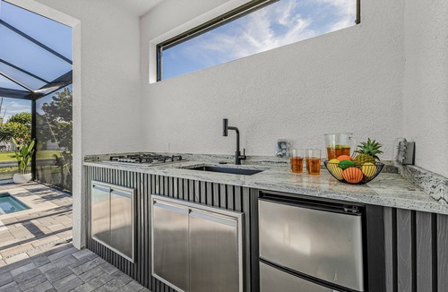 Trafalgar House | Saltwater Pool, Game Room & Canal-View Escape - Gold Coast Getaway - Roelens