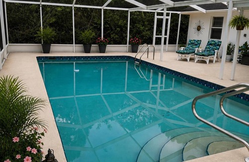 Placid Lakes House | Serene 3-bedroom 2 bathroom house with pool and dining area