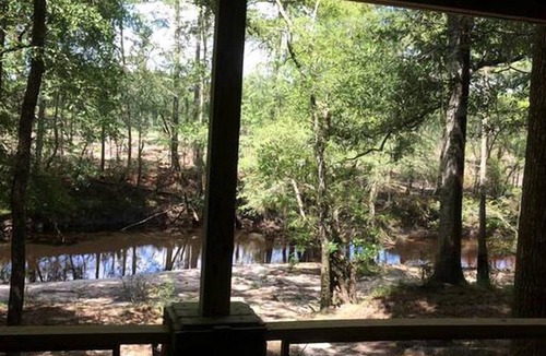 Claxton Cabin | Serenity by the River: Glamping in Claxton, Georgia