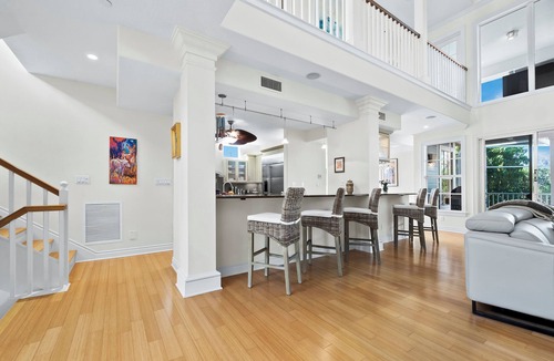 Whitney Beach House | Sleepy Lagoon 4+bd/3.5ba canal home, 5 min walk to beach on LBK