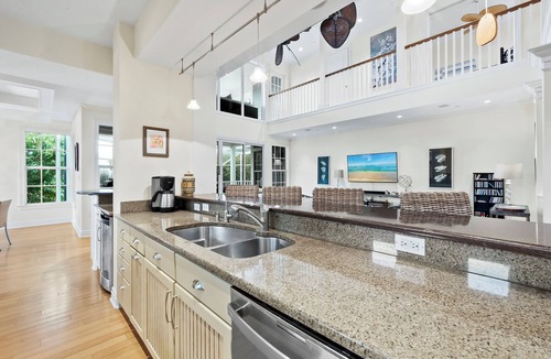 Whitney Beach House | Sleepy Lagoon 4+bd/3.5ba canal home, 5 min walk to beach on LBK