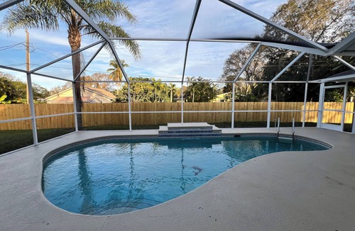 Vero Beach South House | Spacious 4-bedroom pool house with WiFi and AC in charming Vero Beach