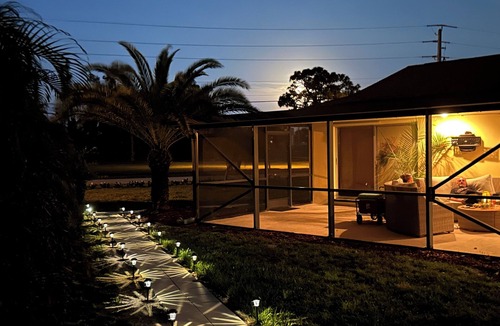 Port Saint Lucie House | Spacious 4BR Lakefront Getaway – Heated Pool, Hot Tub Near Everything!