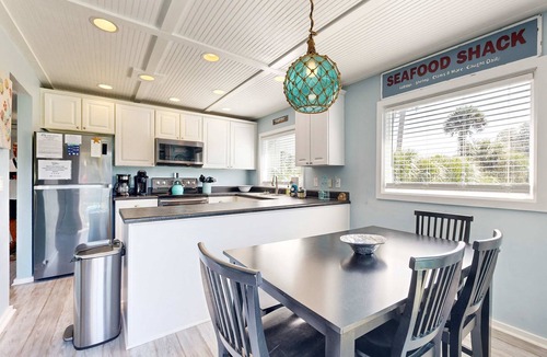 Ocean Ridge Cabin | Spacious cottage with lagoon and golf course views - dog-friendly