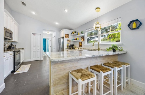 Vilano Beach Villa | St. Augustine Villa – Walk to Beach, Hot Tub & Fire Pit