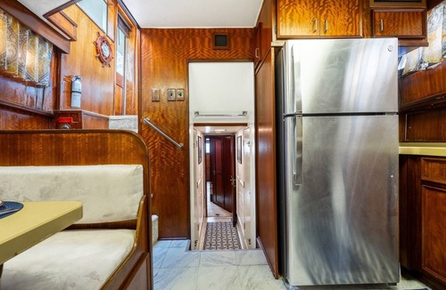 Aventura Boat Rental | Stay Aboard a Vintage Hatteras 53' Motor Yacht in Aventura-A Unique Experience!