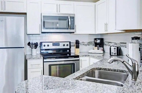 West Kissimmee Hotel | Stay in Comfort for a Stress-Free Escape Near Orlando Cat Café - 1.9 miles