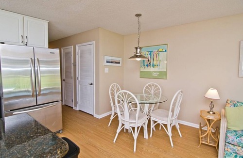 Emerald Isle Condo | Steps away from the Ocean, Gym, Gazebos, Indoor/Outdoor Pools, & Tennis Courts