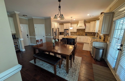 Evans House | Stunning 4-Bedroom Retreat with Resort-Style Backyard in charming Evans.