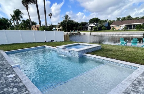 Tropic Palms House | Stunning Delray Beach Waterfront Escape w New Pool & Spa with Dock!