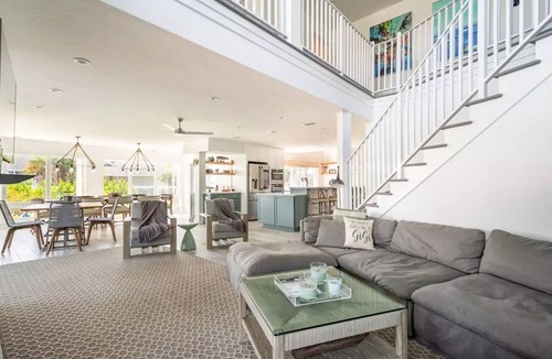 Indian Harbor Estates House | Stunning Luxury Riverfront Pool Home with Boat Dockage