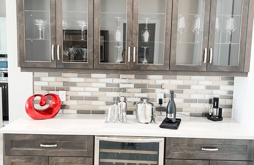 Pelican Villa | Stunning New Waterfront Luxury Villa with oversized Heated pool and Hot tub!