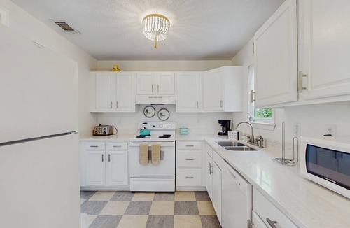 Beach Institute Hotel | Stylish southern stay with two full homes in one, quaint backyard, and walkable