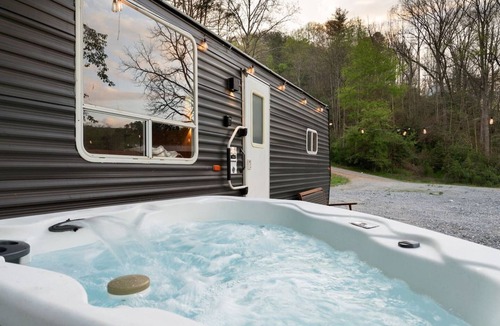 Sylva RV Rental | Tesla Camp, Riverside, Hot Tub & Mountain Views
