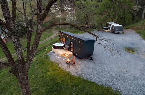 Sylva RV Rental | Tesla Camp, Riverside, Hot Tub & Mountain Views
