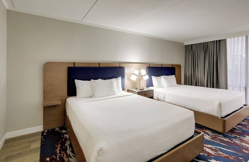 Quincy Hotel | The Atrium Hotel on Third