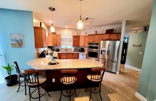Fort Pierce Shores House | The Beach House Retreat Resort-Style Pool & Coastal Elegance