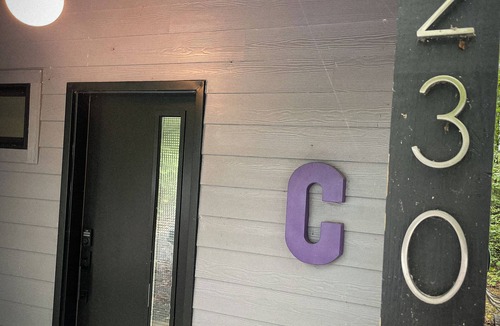 Cookeville Hotel | The Premier Mini Modern Cabin is a perfect romantic retreat for two or a peaceful self-indulgent getaway for the one and only you! A luxury suite designed for no more than two. inside you'll find love is in the air with our sleek designs and
