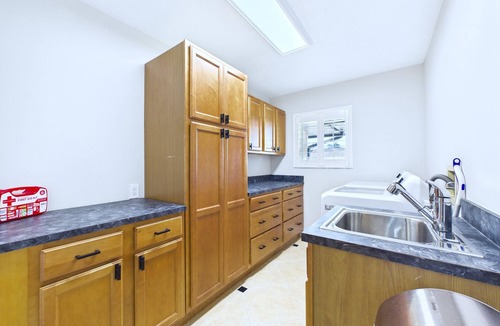 Tropic House | This beautifully furnished 3-bedroom, 2-bath pool home offers bright open living spaces, a private backyard oasis, and the perfect setting for relaxing after a day at the beach. Ideal retreat for families, couples, and beach lovers alike.