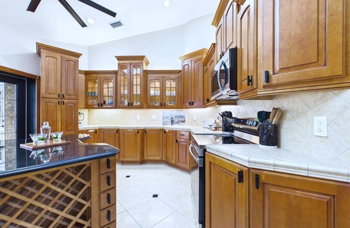 Tropic House | This beautifully furnished 3-bedroom, 2-bath pool home offers bright open living spaces, a private backyard oasis, and the perfect setting for relaxing after a day at the beach. Ideal retreat for families, couples, and beach lovers alike.